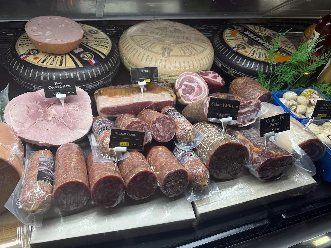 Salami, speck and coppa behind the glass